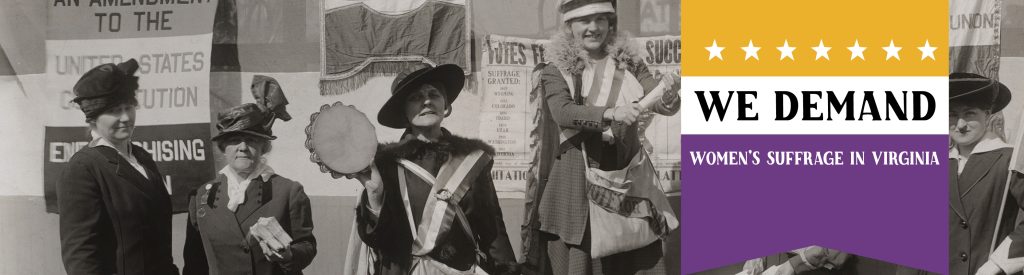 A group of women with suffrage banners